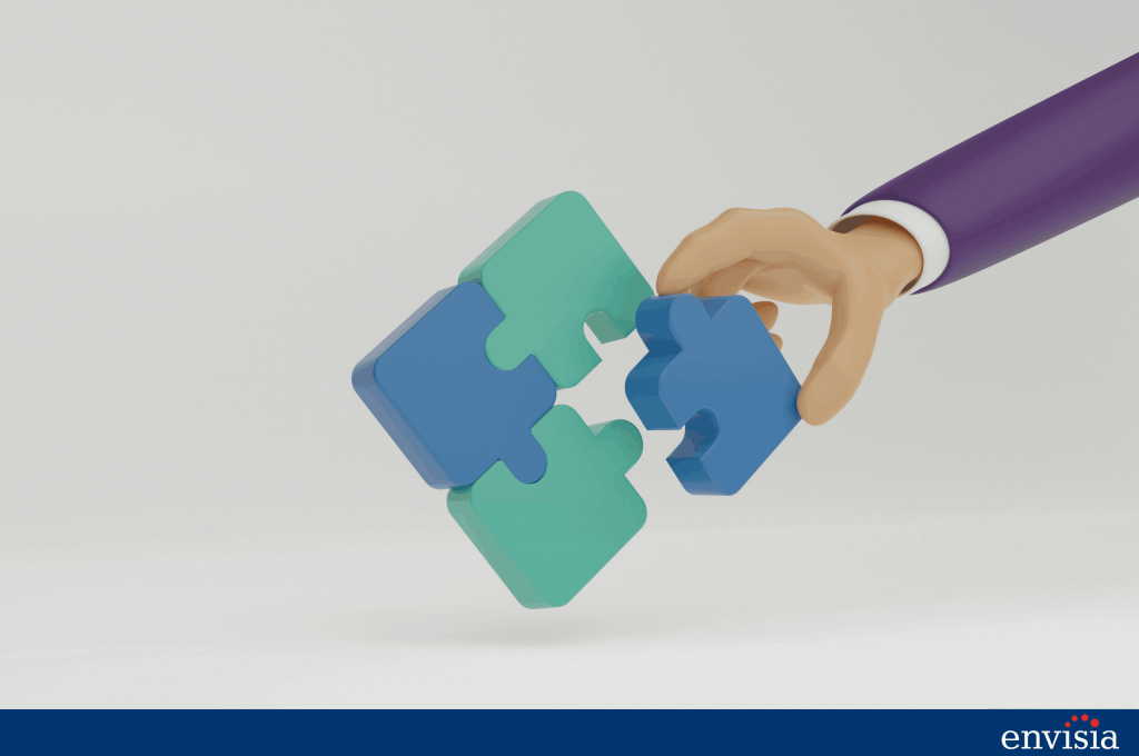 Hand placing a puzzle piece to illustrate how open ended comments add context and insight in 360 degree feedback