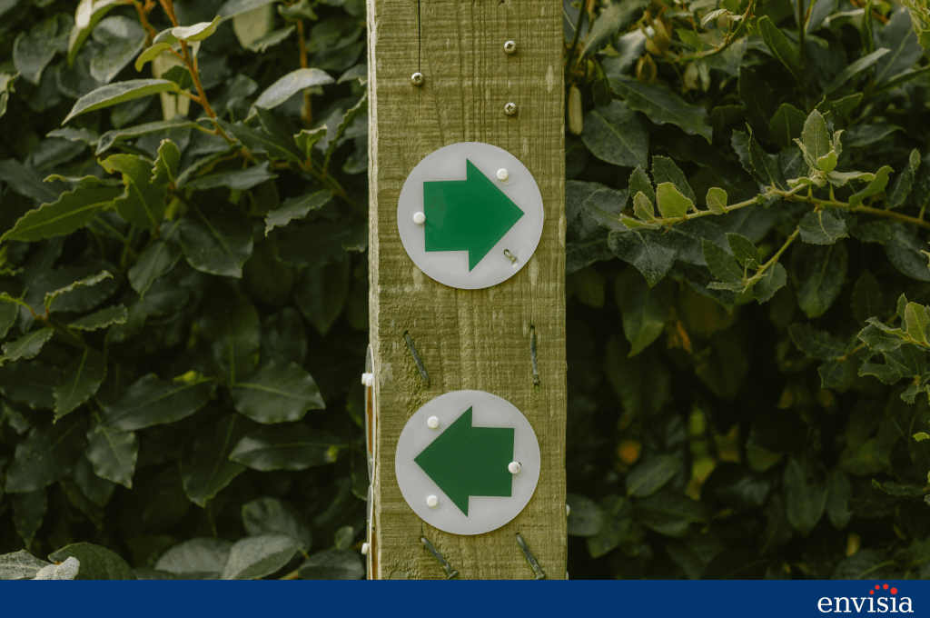 Directional arrows pointing different ways to represent choosing the right development path from 360 feedback results